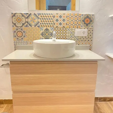 Mardelava تيناجون